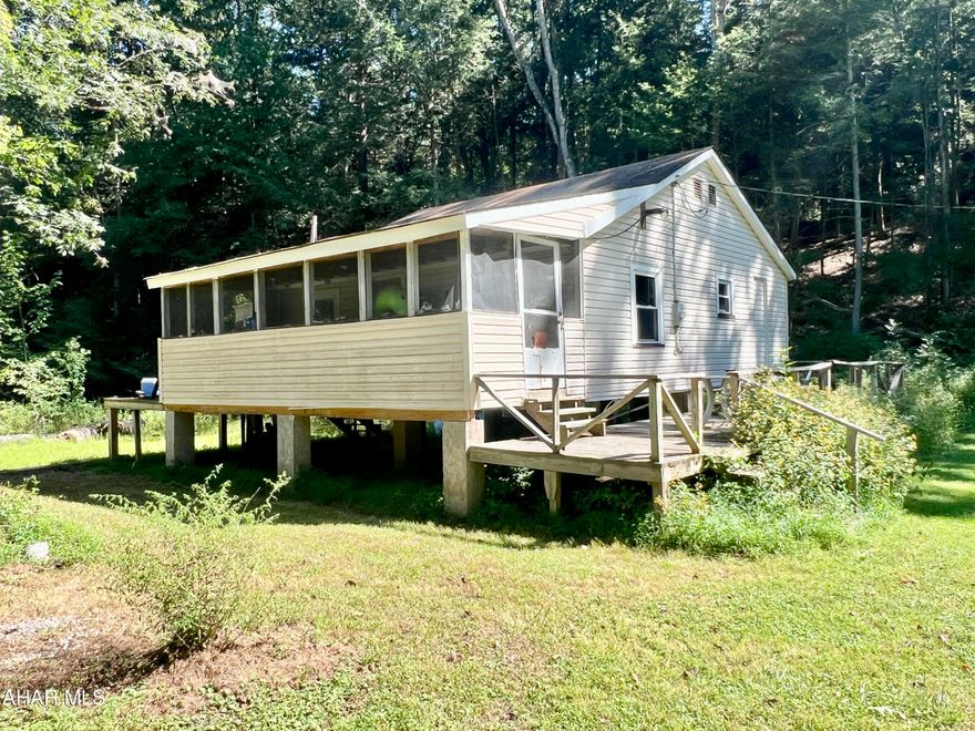 Hard to find cottage located overlooking the Raystown Branch of the Juniata River! With work, this property would make a great place to kick back and relax to enjoy the outdoors. The Juniata River offers a great place to Canoe, Kayak, Swim, and Fish.