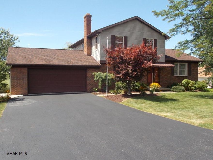 Three bedrooms, 2.5 baths, 2 story on a corner lot. Parquet floors in the living room and dining room. Updated kitchen with new stainless appliances. 1st Floor laundry, eat-in kitchen, a family room with a fireplace finish the first floor. Upstairs 3 nice sized bedrooms and 2 baths. Large walk out basement is a great place for kids to play. The 2 car garage is over sized and allows plenty of room for storage. The deck is large with a retractable awning and has a great view. The hot water heat has 3 zones for lower bills.