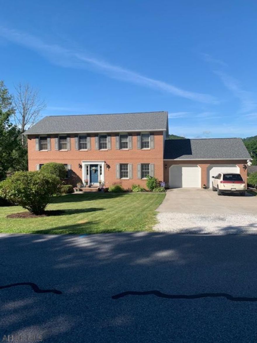 Beautiful 5 BR brick colonial on level lot in Penn Farms.  The first floor hosts an open floor plan.  Updated E/I kitchen opens into family room and living room, large dining room and laundry.  A master with a walk-in and private bath and 3 other large bedrooms, and full bath on the 2nd floor.  The walkout basement has large BR, full bath, and huge recreation area and storage area.  French doors lead to inviting deck overlooking level manicured yard.