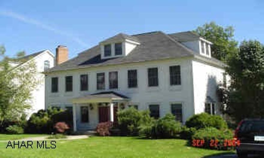 FANTASTIC HOME in prestigious neighborhood. This one has it all - location, size, features. First floor family room and laundry, formal dining room plus eat-in kitchen. 4 bedrooms, 2 car garage and central air. Large attic and basement are mostly finished.