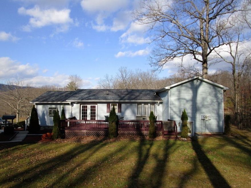 This rancher rests on 5.9 acres just a few miles south of the Omni Bedford Springs. Home offers 3-beds, 2-full baths, living room, kitchen and dining room. Partial basement finished with a large family room, den and additional half bathroom. Front and side porch, rear deck, three car detached garage and 30'x60' pole built garage.