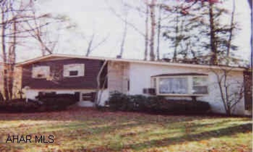 4 LEVEL SPLIT. GREAT SETTING! VERY PRIVATE BORDERS A STREAM. CALL LISTING AGENT FOR DETAILS ON PROPERTY. OWNERS TRANSFERRED.