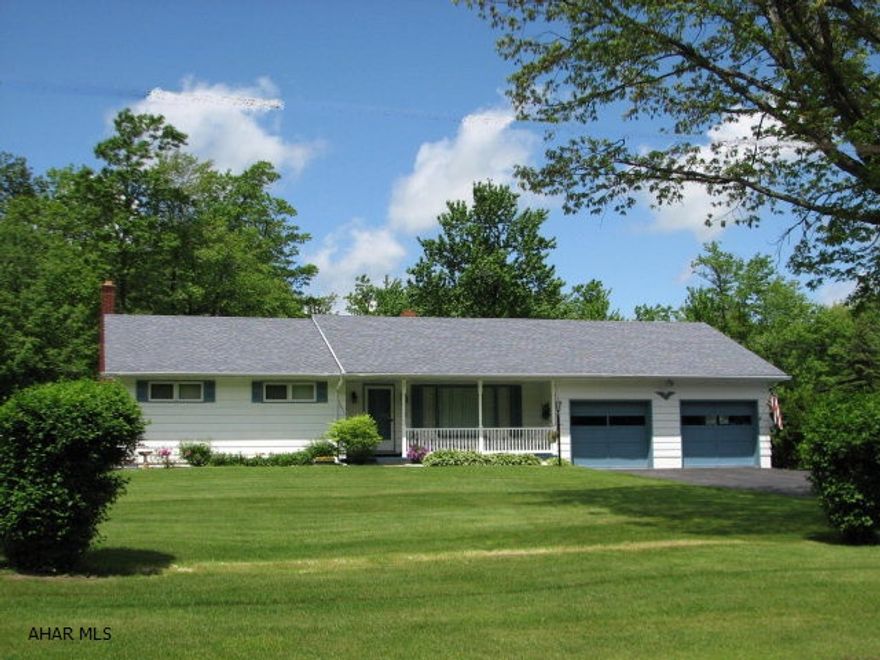 OPEN HOUSE - SUNDAY, OCT 16, 11:00 - 12:30..SO MUCH LARGER THAN IT LOOKS! DON'T JUST DRIVE BY! Enjoy living out of the city, yet close to all the conveniences!!   Truly must see inside to appreciate. Immaculate 3BR, 1.5BA ranch home with an awesome heated sunroom in rear of home-- very bright and private...  Spacious kitchen with abundance of cabinets and countertops. Combination heat source - oil heat (brand new furnace), plus a coal furnace. Roof was installed in app. 2005.    Home is situated on a 145 x 200 level lot, nicely landscaped. There is attic storage (access is in garage) Home is 1 mile from Gallitzin, 4 miles from Ashville, and app. 9 miles from the Allegro.  live in the country with the peace and quiet and gaze at the stars in the evening yet only drive minutes for shopping,,