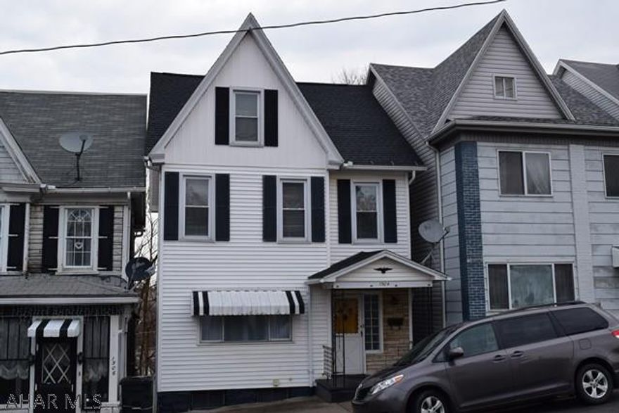 Move in condition and well maintained 3 bedroom home with a full walk up attic that could be used as a 4th bedroom. Newer roof and hot water tank and many new replacement windows. Private covered back porch and small fenced in yard. Very Clean/dry basement. Call today for a showing