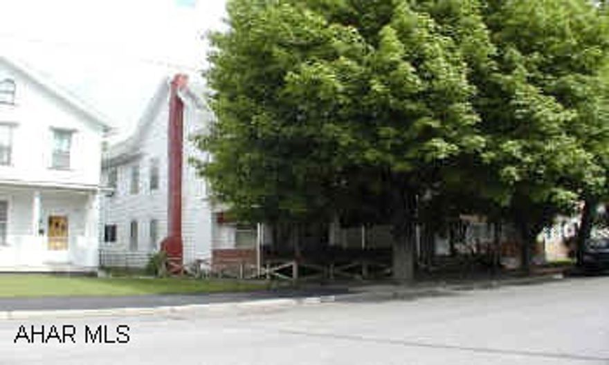 Nice 3 bedroom home with finished 3rd floor.  Hardwood floors, newer gas hot water furnace.  2 car block garage.