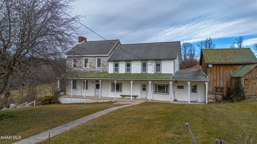 Historic Farm with Two Homes, a Huge Barn, and Acres of Possibilities in the Heart of Bedford County. 

The Large Farm House on 45 Acres was built over Three Centuries Featuring 4 Bedrooms and 3 Full Bathrooms. The Original Stone Section was built in the 1760s. The Spacious Main Section added in the 1890s. The Back Section was built in the 1900s containing the Kitchen and Laundry Room and connecting the Classic Summer Kitchen. 
This Roomy Home Includes a Formal Dining Room, Various Living Areas, and Vintage Hard Wood Floors. The Original Section of the House has a Unique Basement with a Barrel-vaulted Ceiling (the only known one of this Style in this Part of the State). 
 
The Second House with 4 bedrooms and 2 full baths was recently Rehabbed and can be used as a Single Family Home or easily enhanced to be an Up and Down Duplex. Nice Deck in the Back, Solid Wood Trim throughout, and Great Layout Provide very Comfortable Living. The Bottom Floor has a Full Kitchen, Living Room, 2 BRs, and Full Bath. The Top Floor Features 2 BRs with Walk-in Closets, Living Room, Full Bath, and Laundry Room. 

The Great Barn (82' x 72') Provides So Much Room for Storage, Animals, Work Shop, or other Uses. The New Barn Roof Includes Skylights and the Upper Level has Tongue and Groove Flooring. The Lower Level has a New Concrete Floor. 
Additional Structures include a Garage, Two Sheds, a Milk House, and the Old Chicken House. ideal for farming, hobby use, or outdoor recreation. 

Conveniently Close to Route 30 between Bedford and Everett. Low Taxes.

The Houses, Expansive Barn, Outbuildings, and Acreage Offer Many Residential, Business, Agricultural, and Pleasure Uses. Continue Making History at this One of Kind Property.