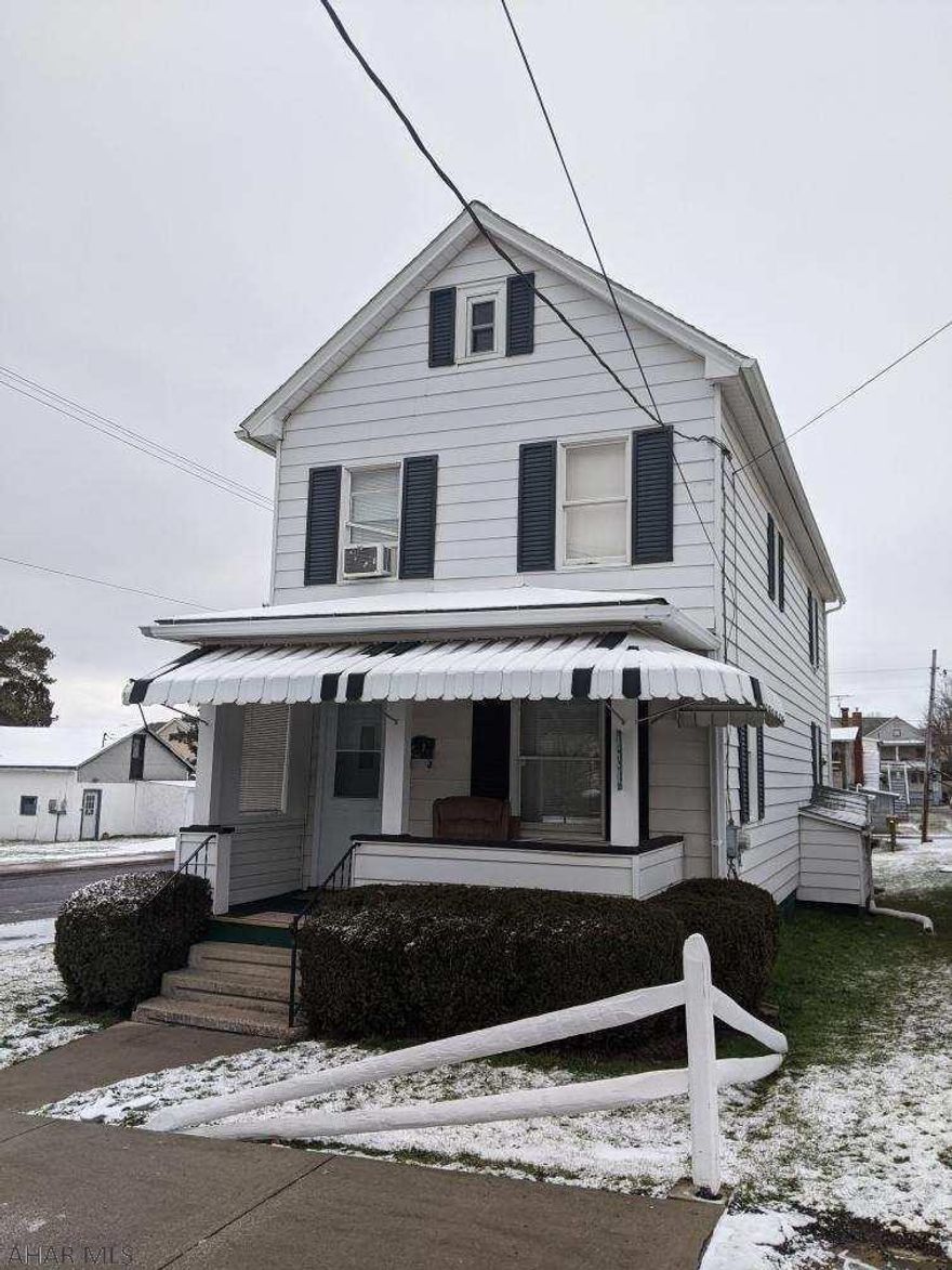 Beautiful vinyl sided 3 bedroom two story home on a corner lot. Well maintained home that should qualify for usda financing. Detached one car garagew/workshop. Large rear deck.