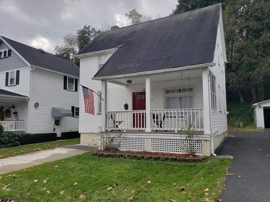 Move in ready 2 bedroom 1 bath home in Toy Town! This home has many upgrades and is move in ready. Having 2 porches with a double lot adjoining to the woods, makes entertaining endless! The first floor is bright and welcoming, along with a formal dining room if you prefer private meals. The bedrooms are large in size and have nice size closets for storage. The second floor bathroom has been updated as well.  Call listing agent for your private tour today!