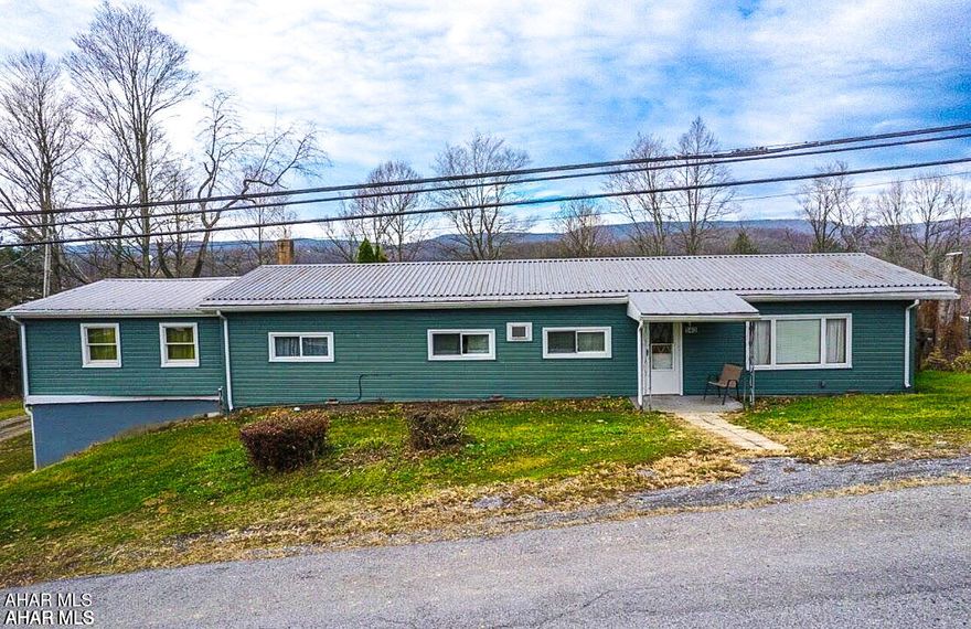 Welcome to your next chapter in Tyrone!
This charming 3-bedroom, 2-bath home is filled with potential and ready for your personal touch. The bright, eat-in kitchen is perfect for casual mornings, while the large dining area sets the stage for memorable gatherings. Step outside to enjoy a spacious yard—ideal for gardening, play, or relaxing summer evenings—and take advantage of the convenience of a detached 2-car garage, with a bay under the house.   YES, a 3 bay garage.

Situated in the heart of the welcoming Tyrone community, you'll appreciate the highly regarded Tyrone Area School District and the small-town charm that makes this area so special. With a little vision, you can transform this property into the home you've been dreaming of.