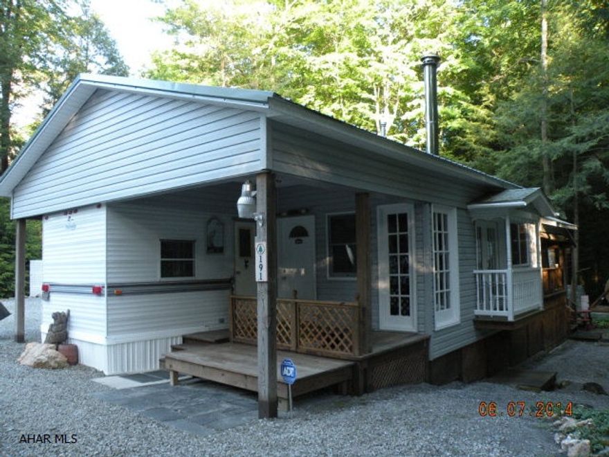 Enjoy this great get-away! 2 BRs full bath, long LR with view of beautiful stream. Stone patio with 5 ft water wheel, 30 gal water tank, new range & refrigerator & much more! 2 beautiful lots with stream. All the amenities of Glendale Yearound. Minutes from Rock Run ATV trails & State Park.