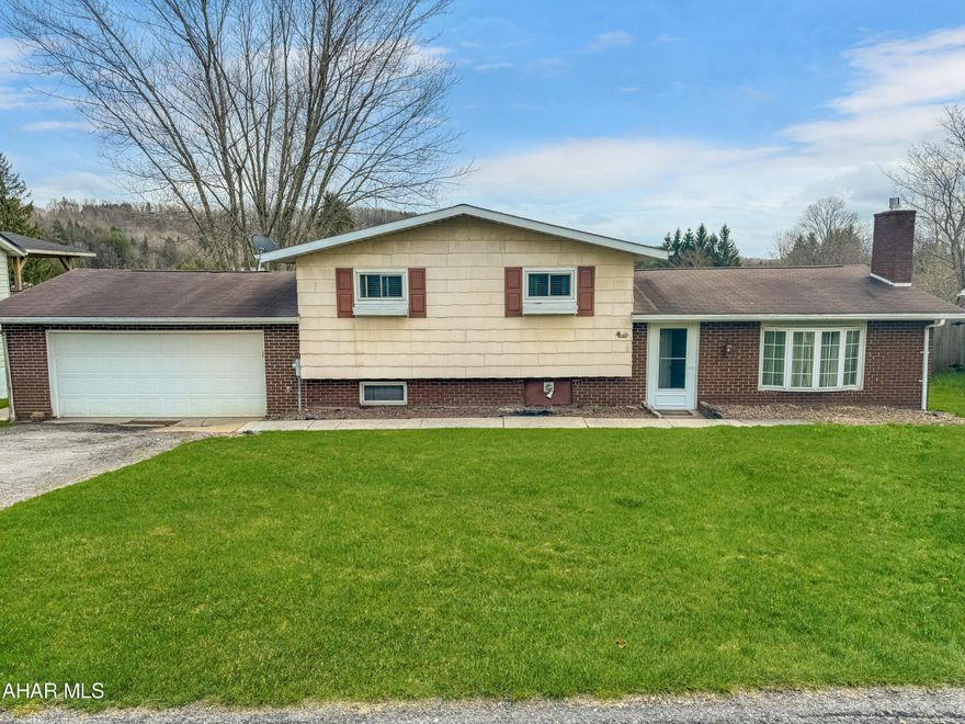 Welcome to 133 Karen Street in the Central Cambria School Districts, Cambria Township. This stunning tri-level home is just a minute's walk from Lake Rowena, the Tennis Center, Ghost Town Trail, & various other attractions. Upon entering, you are welcomed by a spacious living room w/ a cozy propane fireplace. Adjacent is a dining room w/ sliding glass doors leading to a rear deck, along w/ a beautiful kitchen w/ included appliances. Moving up a few stairs, you'll find 3 roomy bedrooms & a full bathroom. The basement boasts a living area, a fully updated bathroom, laundry facilities, access to your 2-car attached garage, & ample storage space. Additionally, the property includes a pellet stove, a private yard, off-street parking, & so much more. Don't miss the opportunity to schedule a tour today & make this your new home!