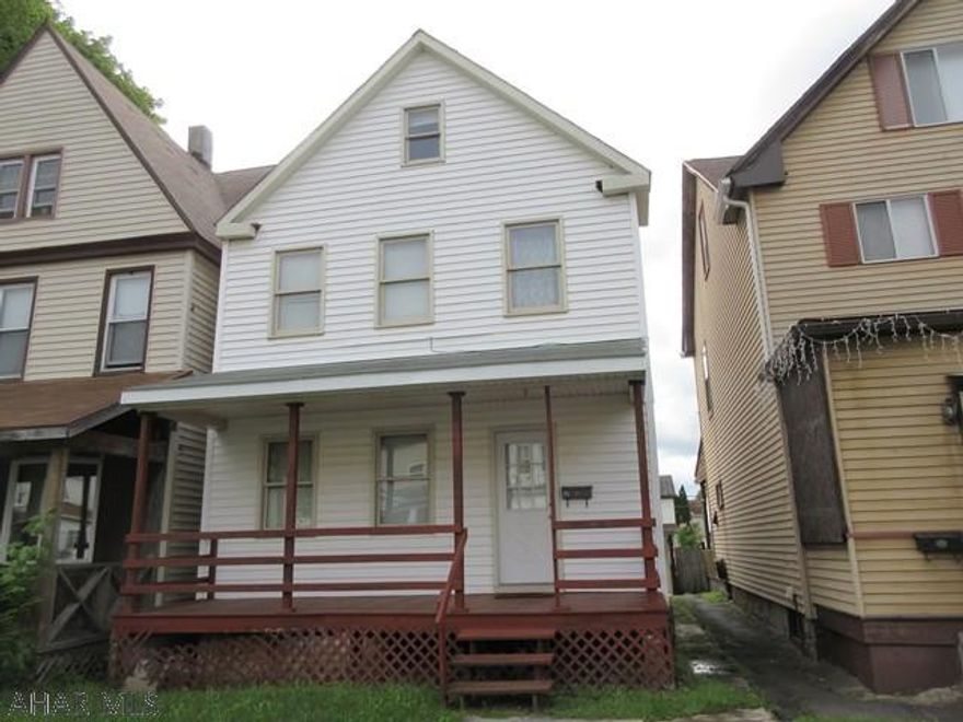 2 story vinyl home in nice Altoona neighborhood! Nice oak kitchen, formal dining room, large living room, 3 bedrooms, 1 bath. All vinyl siding and windows. Attic with permanent stairs for plenty of storage. Home was previously stripped and re-drywalled throughout.