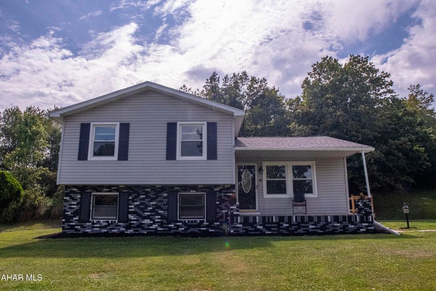 Welcome to this beautifully updated split-level home situated on a spacious, flat lot just over three-quarters of an acre.

The interior features a bright living room, a large eat-in kitchen, three comfortable bedrooms, two full bathrooms, and a partially finished, fully functional basement.

Recent updates completed in 2024 and 2025 make this home truly move-in ready, including two brand-new decks, a new water heater, and additional improvements throughout. These thoughtful upgrades add both comfort and peace of mind for the next owner.

Enjoy the expansive outdoor space with plenty of room for recreation, gardening, or relaxing on the new decks while taking in the peaceful setting. This property offers a great combination of modern updates, functional layout, and a desirable location in the Claysburg-Kimmel School District. Schedule your tour today.