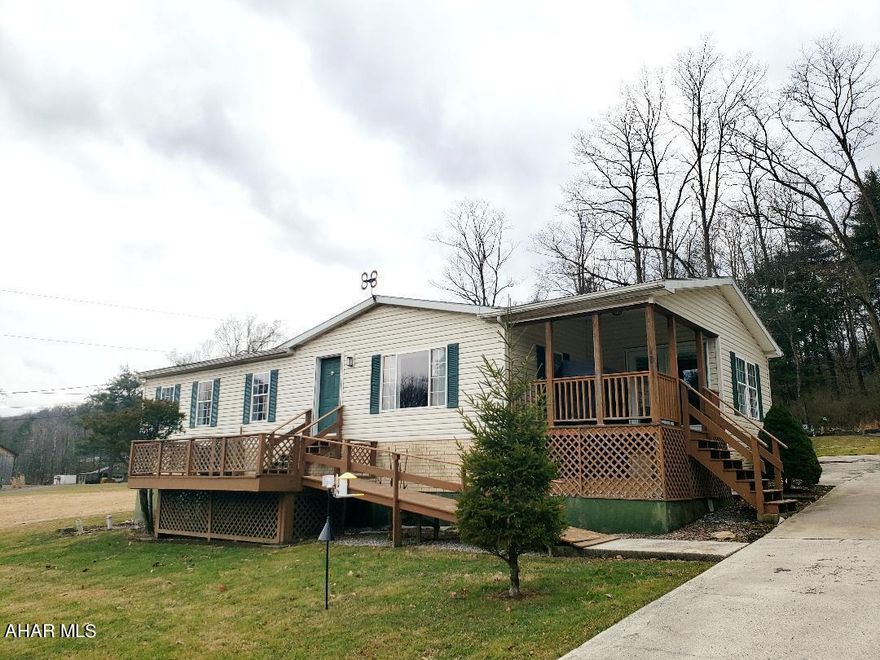 Easy and peaceful country living just waiting for you! One story home with lovely views, an updated interior with plenty of luxurious features and details, and abundant storage options with a large workshop and shed are all the reasons this would make a truly delightful home. Enjoy the large 1/2 acre yard, yet also take advantage of easy commutes to State College, Tyrone, Altoona and more! The home has been updated over the last couple years and the list of updates and upgrades been done with convenience and enjoyability in mind. An attached list is provided to go into more detail about all the lovely features you could be enjoying if you don't wait and jump on this gem today! Manufactured title has been retired.