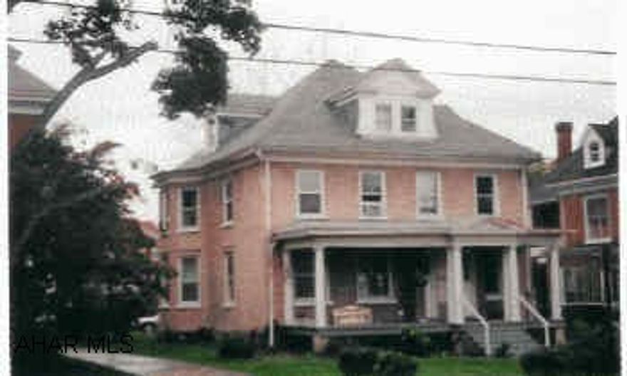 Currently a business, could be a single family residence. Has had some remodeling, nice location, new floors, large rooms.