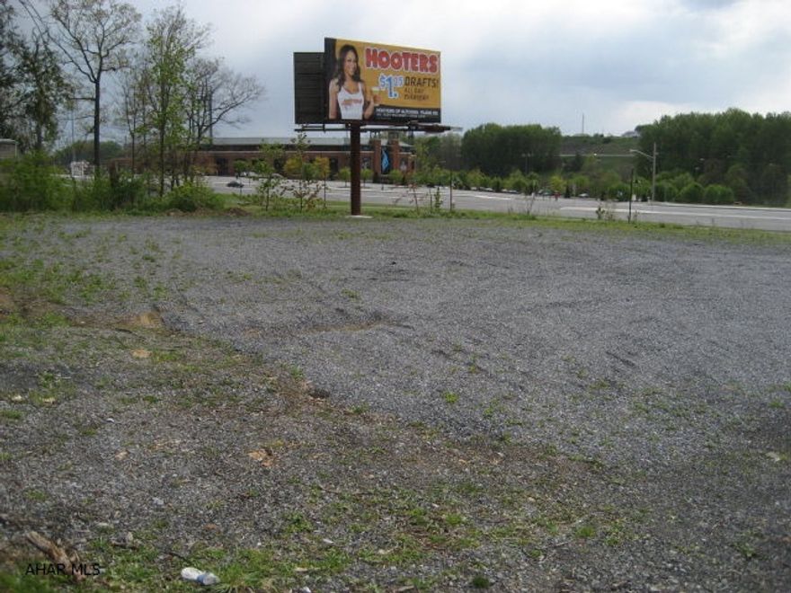 High visability Zoned Business located near the Peoples natural gas field & the new proposed new Sheetz Store. Engineer study and appraisal on file. This property can  Purchased with 3 Bd home at 256 Stillwood Dr. set on a 57X135 Lot could be used as a  professional office or keep current tenant for extra income.