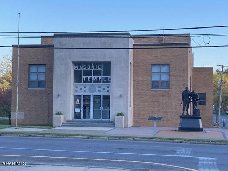 So many possibilities for this building! 13,240 sqft in total with 9,120 rentable space. Currently an event center on the main floor with a 21x19 kitchen, 14x20 stage and a 47x78 banquet room. Lots of storage, private and public restroorms on first floor with a separate bar area. Second floor is currently a large meeting room, offices and more. Ample parking for events. Let your imagination go with this gem.