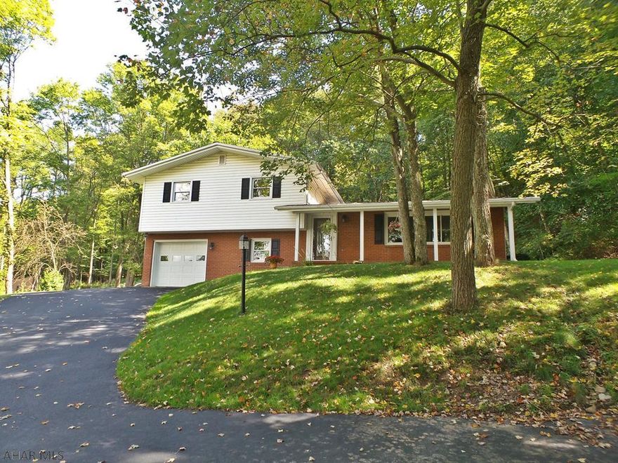 Beautiful Tyrone split level across the street from Tyrone Hospital and Tyrone School.  Three bedrooms, 1.5 baths, central air with 3 heat zones!  Garage, 135x145 foot lot.  All appliances are included!  Home has all new paint, outside faucets and a heated basement.