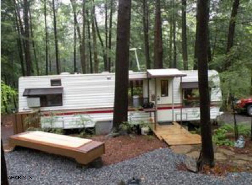 Priced to sell! TOO CUTE, you dont want to miss this one! 29' Terry camper, drywalled, new carpet, spotless.(sleeps 6 or 7)  Located on 2 great lots. All the amenities of Glendale Yearound & minutes from Rock Run ATV trails.