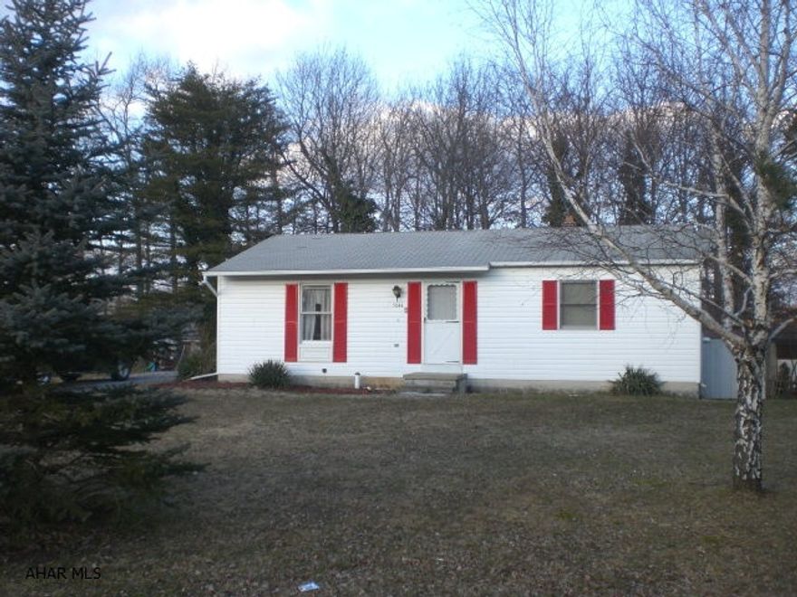 Charming Ranch in Lakewood Manor Development. Large .459 Acre lot w/ mature trees. Vinyl sided, shingle roof & thermo pane windows. Full Bsmt, Electric BB heat & 200 AMP electric. Separate flue for wood stove or pellet stove. Kitchen w/oak cabinets, DR, LR, 2 Beds & 1 Bath.