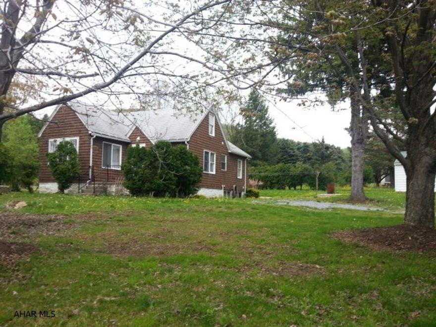 Cute 1 1/2 story cedar sided home. Large yard with grape vines perfect for jam making. Worried about parking, this home features a one car garage with garage door opener for those cold winters. Larger than it looks!