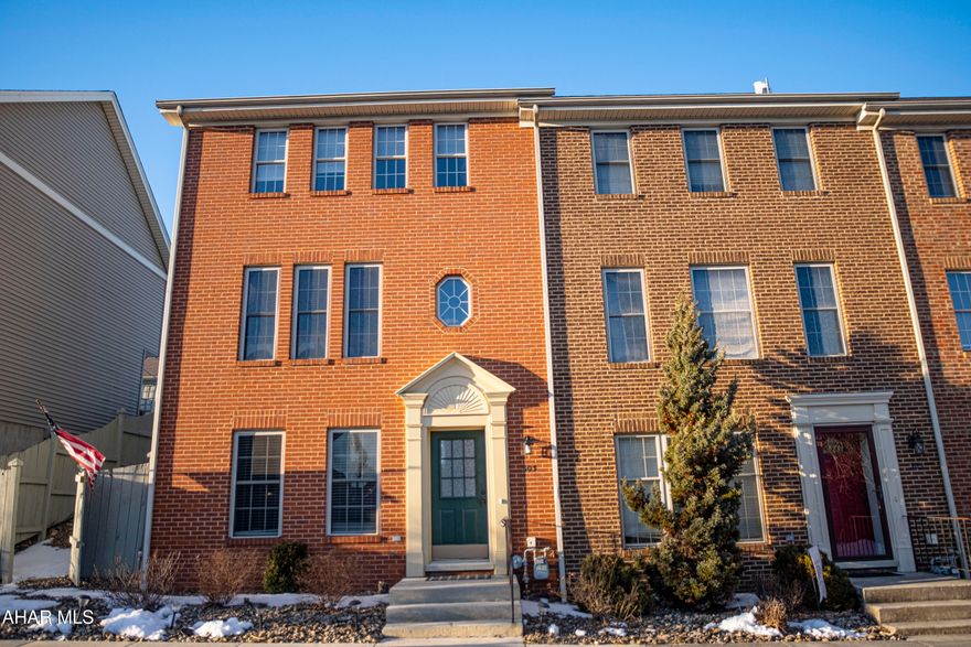 Welcome to this stylish end-unit townhome in the sought-after Sweet Cherry Court. Designed for both comfort and functionality, this home offers a covered deck overlooking a fenced backyard - perfect for relaxing or entertaining. The entry-level floor features a versatile space that can serve as a family room, home office, or even a first-floor bedroom. Upstairs, the modern kitchen boasts a breakfast bar and spacious dining area, seamlessly connecting to a cozy living room and convenient half bath. The third floor hosts two generously sized bedrooms, including a primary suite with ample closet space, along with a centrally located full bathroom. With two dedicated off-street parking spaces, this home effortlessly blends style, convenience, and practicality. Check out our Matterport 3D virtual tour and schedule a showing  today.