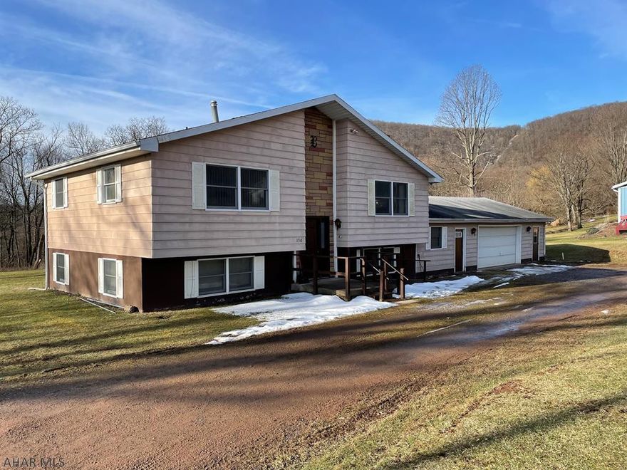 Home has a septic system. The owner will  not agree to a dye test. The system has worked satisfactorily since 1978. The home is 1975 decor. There is an oil hot air furnace in the attic. There is AC integrated. There are 2 new oil tanks at the rear of the home. The inground pool is working. There is a large, concrete apron and chain link fence surrounding the pool. The rear deck has some wood that needs replaced. Do not walk down stairs.