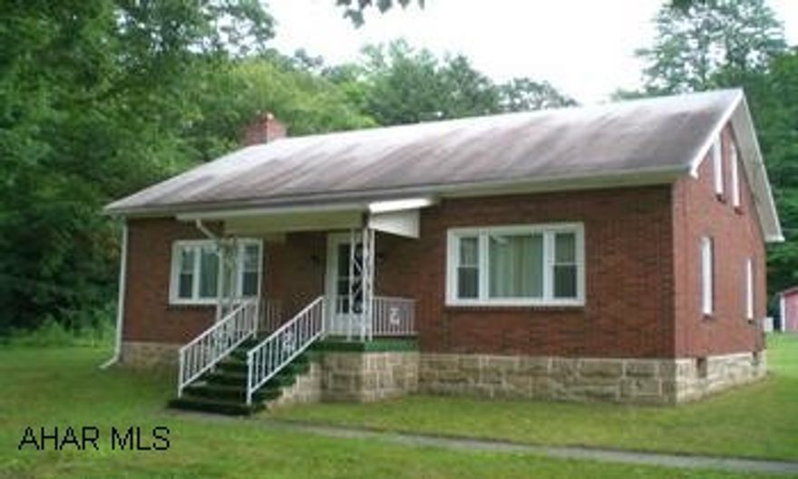 Solid 1.5 story brick home. Hardwood floors under all carpets. Living area in basement w/ woodburner. 2 car garage.