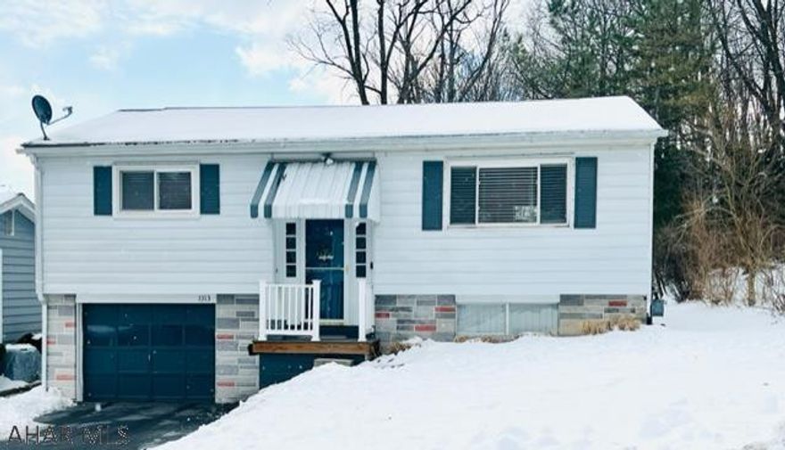 Check out this beautiful and cozy 3 bedroom, 2 bathroom bi-level home situated on 2 city lots in a wonderful and quiet neighborhood.  This home features an integral garage with off street parking, a brand new hot water boiler furnace, and central air.   Enjoy the large backyard which is perfect for playing, or entertaining or relax and enjoy a great view on the beautiful new composite deck with direct access to the kitchen and main living areas.   Pre-qualified buyers only.  Buyer to confirm taxes, square footage and lot size.