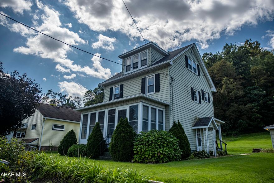 Well maintained two story home on a little over a half an acre. This home boasts an enclosed sun porch, large yard and a detached two car garage.  Home features 3 bedrooms and a full bath. Open concept dining and living room. Check it out. schedule your tour.