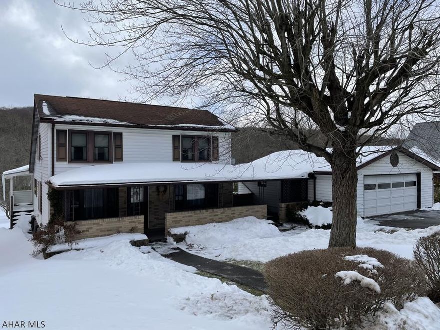 Nanty-Glo 3 BR cape cod on 1.7 acres. Remodeled kitchen. Large rear deck with covered pavilion area. 2 car attached garage. Access to rails to trails from the back yard. Priced to sell at $74,900