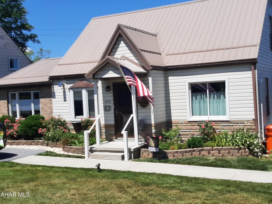 Welcome to this well maintained and charming home in the Mylo Park area of Ebensburg, Central Cambria SD. This home welcomes you right from the front door, The foyer is spacious enough to kick off your shoes, hang your coat and move right in! The spacious and open living/dining combination offers LVP throughout, natural light and a pellet stove for cozy evenings. The kitchen offers ample storage and counterspace to prepare for those large gatherings. Also included are updated appliances. The quaint den has natural lighting and built in book case. Also on the main level is the primary suite, walk thru closet to the en suite. Main level living! The second level offers 2 great sized bedrooms and full updated bath. The lower level offers a partially finished basement with laundry, family room, half bath and plenty of storage areas. Walk out from the family room to the lovely patio area. Beautiful perennial gardens, privacy, shed and additional parking are offered in this very well manicured back yard. So many upgrades to this home! It is priced to sell! Call today for your tour!