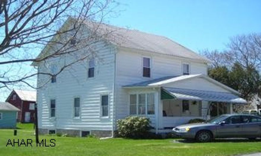 Lovingly maintained and updated 2 story located in Schellsburgh borough.  Improvements include central air, roof (tear off), front porch floor, windows, glass blk windows in basement, interior paint, spouting, breaker box. Two detached garages. Nothing to do here but move in and enjoy the beautiful natural woodwork, handmade kitchen cabinets, walk-up and finishable 3rd floor, central air, covered front porch, 2 enclosed porches, 2 detached garages. Kitchen appliances stay!  Clean, clean, clean! AGENTS - total commission for first 30 days = 5%, 6% total thereafter and split on a reciprocal basis. All showings thru listing agent only, call Tina at 814.242.2047 OR 814.623-3295.