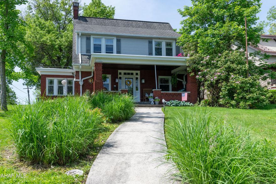 Wonderful family home in Fairview with great views.  Gracious open front porch perfect for relaxing on warm summer evenings.  Spacious living and dining rooms, sunroom and kitchen with breakfast bar. Crown moulding in first floor.  Decorative hardwood floor in dining room which is repeated in the living room now covered with carpet.  Three bedrooms and bath on second floor.  Basement has finished den with built in shelves, office area, combination laundry and bathroom with walk in shower.  Two cedar closets.    Newer gas hot water furnace and water heater.  Lots of storage space.  Two storge sheds at rear of property.  Off street parking.   NOTE:  Dishwasher does not operate and will not be repaired by seller.