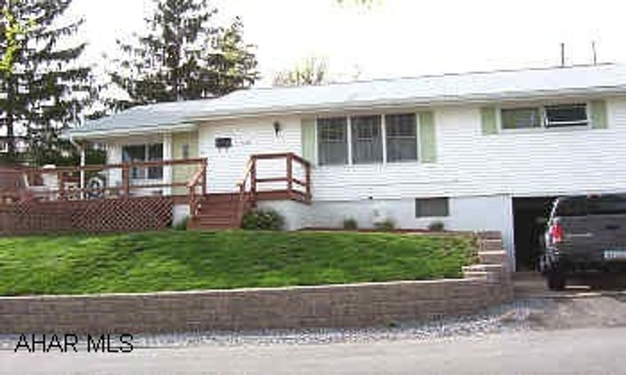 Lovely ranch home in great neighborhood, newer living room addition & deck, family room, and large dining room. Off-street parking in rear and integral garage.