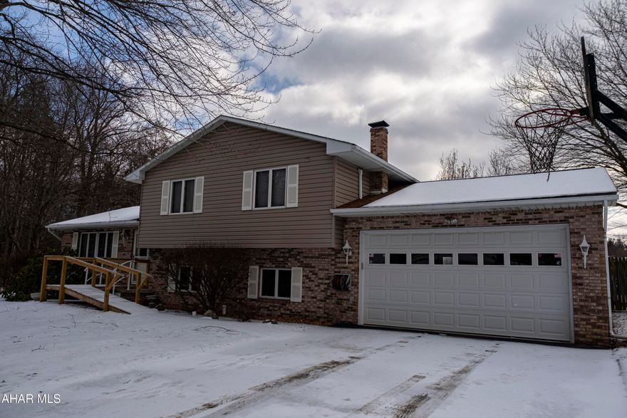 Welcome to your dream home! This charming split-level  residence offers the perfect blend of comfort, style, and outdoor entertainment.  

Step inside and discover a spacious layout designed for modern living. The heart of the home is the inviting eat-in kitchen, and living room.

The family room, complete with a wet bar, is an entertainer's delight! .  Three generously sized bedrooms  Two full bathrooms provide convenience and comfort

The lower level also houses the laundry area, making chores a breeze.  A central vacuum system adds an extra touch of convenience, simplifying cleaning and maintaining a pristine home. a 2-car attached garage provides secure parking and additional space.

But the real magic of this home lies in its outdoor oasis.  A  in-ground pool beckons on warm summer days, promising endless hours of fun and relaxation.  The expansive deck is perfect for , sunbathing, or simply enjoying the tranquil surroundings.  The large, well-maintained yard offers ample space for children and pets to play.

This isn't just a house; it's a home where memories are made.  Don't miss the opportunity to make this stunning split-level yours!