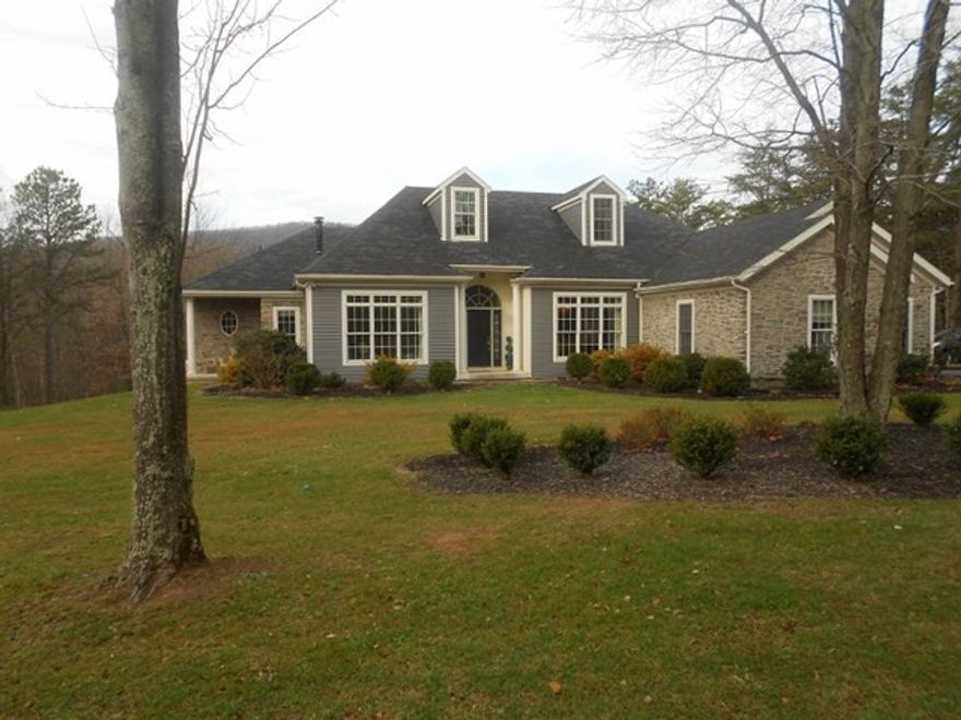 Executive custom built ranch home on 2 private acres.  (28 additional acres are available, MLS #45389, North River Lane).  Upon entry, it is obvious that this is not your ordinary home. Designer touches like tray ceilings  and a great room with floor to ceiling stone fireplace wall flanked by French doors on either side are stunning.  Over 20 feet of granite countertops surrounds the open concept custom built kitchen. Two first floor master suites offer gorgeous marble bathrooms.  The finished lower level includes another master suite with marble bathroom, home theatre, game room and cherry bar.  Too many extra to list must see property!