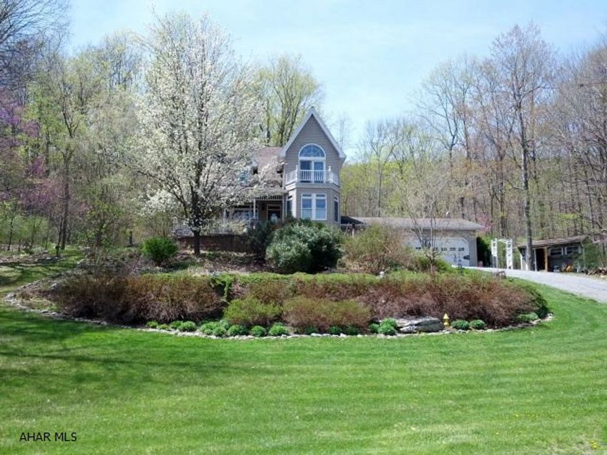 10-Acre Beautiful peaceful setting - borders State Gamelands - modern 2 story home, 3-car garage, 2 sheds and boat storage building, 2 professionally installed coy ponds, and tex-deck. GEO thermal heat and central GEO thermal air conitioning, fireplace, woodburner.  #J-251