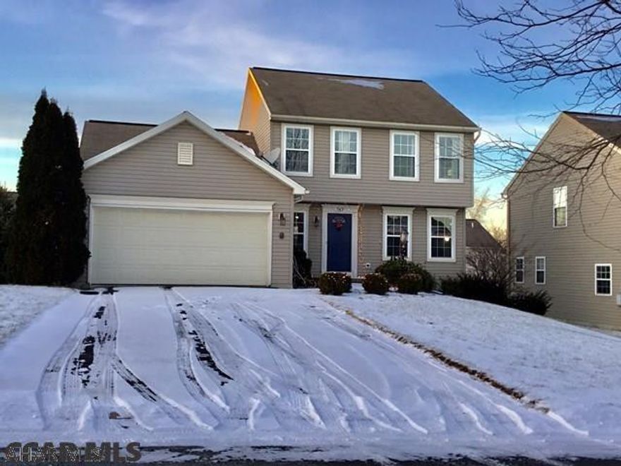 Lovely, Well kept 2-Story with finished basement, lg deck, lots of natural light, lg dining room and oversized garage.