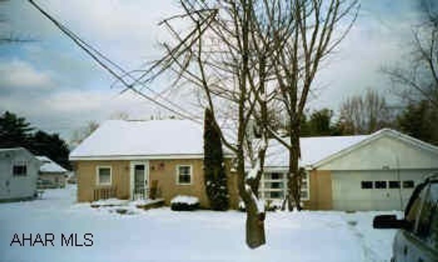 Large lot. 2 car garage.