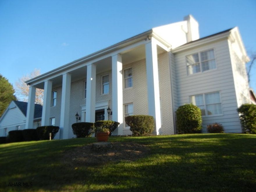 Spectacular view from this Stately 2 story Southern Colonial home situated on 9 Acres, minutes from Hlbg. 4 bedrooms and 3.5 baths.Formal dining rm with crown moulding and wainscoting. Spacious eat-in kitchen.  Enclosed  sunrm creating an abundance of natural light.  A cozy lst floor family rm with stone fireplace and beamed ceiling. Superior craftsmanship and extraordinary care of this home makes it Very SPECIAL!! To view  Visual Tour go to top of page to listing toolclick on movie reel.