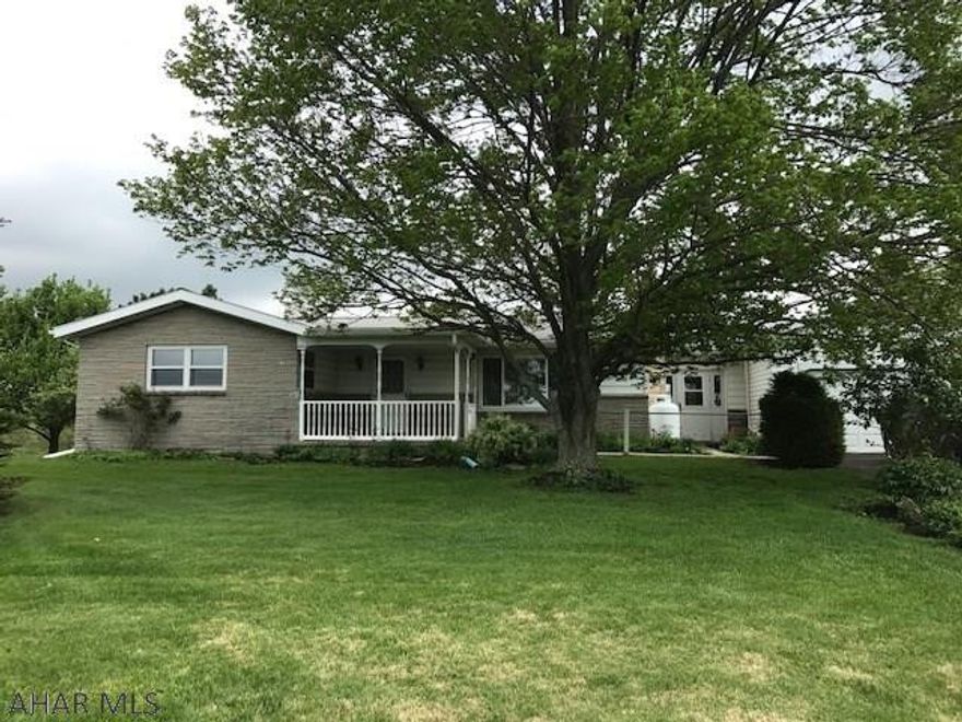 Lovely ranch home with 3 bedrooms and 1  bath. Beautiful country views, refinished hardwood floors, large living room with fireplace, partially finished basement with beautiful fireplace, 3 car garage, surround sound, and hot tub. Extremely nice property. There is a wheelchair lift on basement steps that can be removed if not wanted.