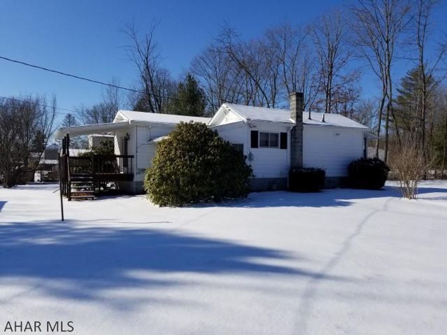 Nice 1 story, 2 bedroom home on large lot in Bellwood. Enclosed porch, Covered Deck.