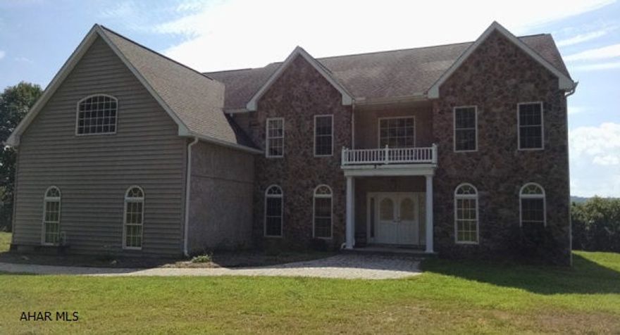 10 year old, custom built Country Mansion on 11 secluded acres in Bedford County Pa. Spacious interior, amazing kitchen with custom made red oak cabinets, granite countertops, 60 inch dual fuel range by 5 Star with 2 ovens, 6 burners, griddle and grill, extra large private office, 4 bedrooms, 3-1/2 baths, upstairs and downstairs laundry rooms, huge master bedroom with fireplace, amazing white marble master bath with spa tub AND fireplace, spacious walk in closets, mirrored changing area, central air, heat pump, oversized 2 car garage, 2500 sq.ft. unfinished basement in addition to 6200 sq.ft. of beautiful custom living space...fantastic country views...short distance to route 70, route 30, I-99, PA Turnpike.. short trip to Raystown Lake. Seller will consider all reasonable offers.
