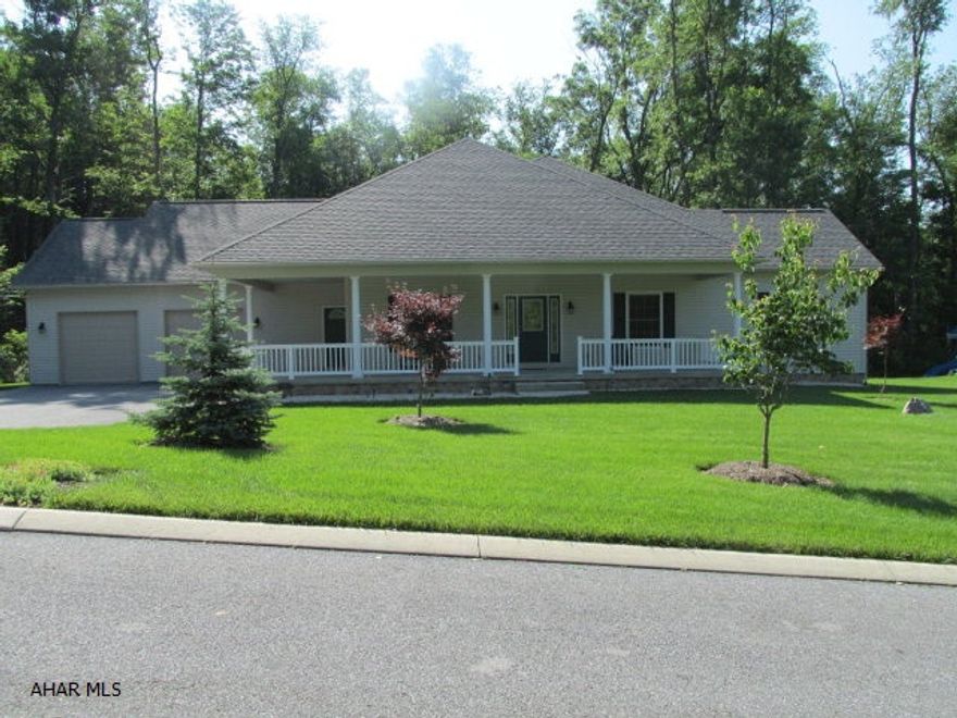 Custom home built by Campbell Builders - 2006. Spacious open floor plan - 9ft ceilings throughout - pergo throughout - carpet in all bedrooms & lg. area rug (custom) in family room with gas FP. Beautiful pecan cabinets in kitchen, stainless range top, wall oven & dishwasher (refrigerator negotiable), sun tunnel skylights in family room, loads of closet space & walk-in pantry. Laundry w/sink, garage w/sink, large partially covered deck with natural gas hook-up for grill. Lg. wrap front porch, great view, gutter guards, 30 year dimensional shingle & radon mitigation system. Water softner is rented (Altoona Soft Water), reverse osmosis system & UV light. Full basement w/huge rec room & storage & full bath (tile). **Possession after Sept. 26th.