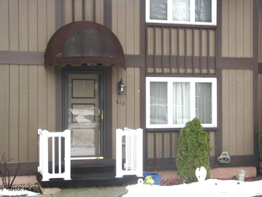 All the space you can get in a stand alone home without all the work. Minimal outside maintenance is needed.  While others are outside mowing grass or shoveling snow you can be indoor enjoying this well kept, cozy townhome.  It has just been repainted and new laminate flooring has been installed on the first floor. Kitchen has a large pantry and a brand new stove. Exiting the kitchen you will find an 8x10 covered deck for you to enjoy whether rain or shine. Living room is large enough to support those large flat screens we all love. Upstairs is two large bedrooms.  Both have excellent natural light.  The finished basement is very large with a walkout to the patio.  And if you are concerned with storage don't. This home has very large closets throughout. HOME WARRANTY!Come take a look!