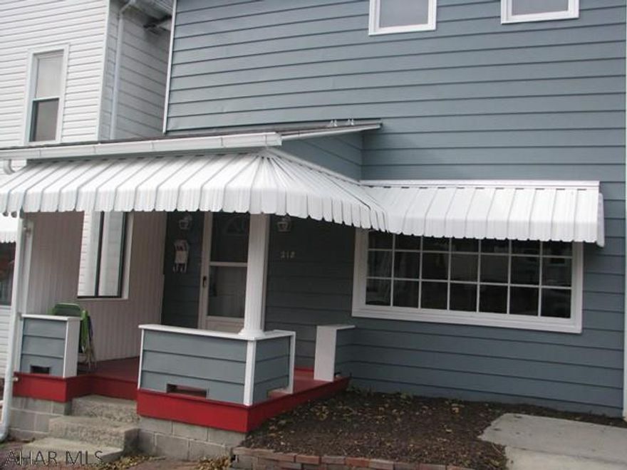 Ready to move in!  Just painted throughout, all new flooring, new lighting as well as new exterior doors on the first floor.  Newer carpeting on the second floor along with new vanity.  Roof , furnace and electrical  have been updated.  The yard is fenced in and there is an over sized one car garage with lots of storage.  New carpet is on order and will be installed with 2 weeks.