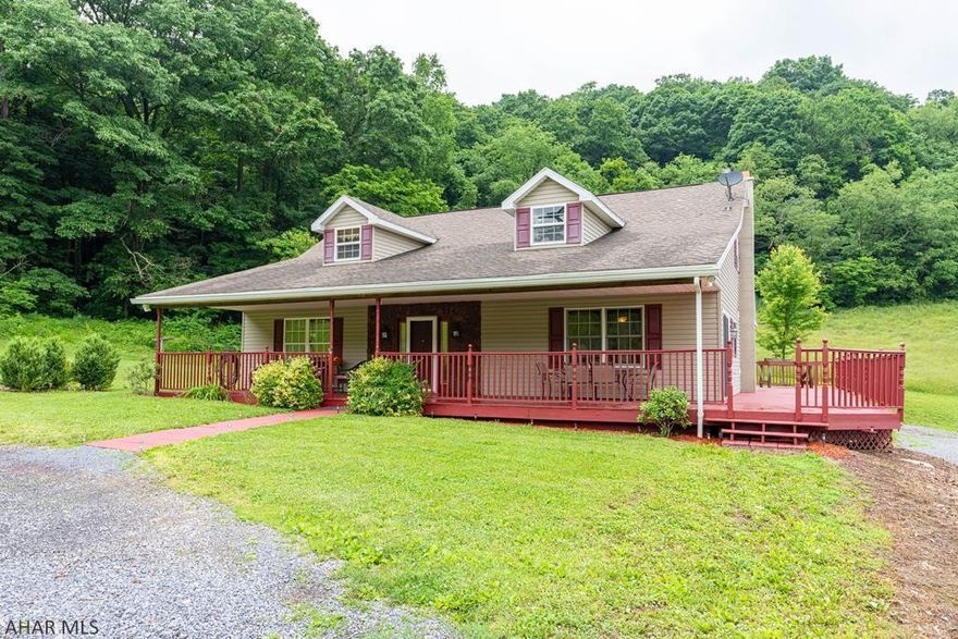 Nature Lovers Paradise!  This pristine 4 bedroom Cape Cod home is nestled on 29 acres! The kit. boasts Hickory Cabinets & tile flooring. Convenient 1st floor laundry room & a first floor Owners Suite with an oversized tiled shower, walk-in closet & an additional closet and a second bedroom & full bath. The 2nd floor offers 2 bedrooms & a full bath. The basement level has a full kitchen, 2 family room areas, a workshop, bonus storage areas and a mud room. Sit on the wrap around porch, look at the priceless views & watch the wildlife. 1.5 miles to the stocked Bobs Creek for fishing and approx. 7 miles to Blue Knob Ski Resort. The property borders Blue Knob State Park. Sale includes additional parcel D-3 113 350.Hydronic electric baseboard oil heat, wood burner, & mini split in the basement.