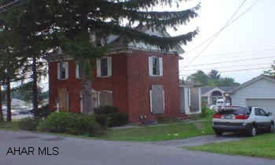 Victorian brick home on almost an acre. Renovated, new carpet, paint, and lighting. Large lot, newer roof, hardwood floors, plus character and charm. Must see inside!