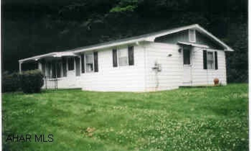 Well maintained home on over half acre. Large yard, surrounded by woods. Great starter home.  Nice location, five minutes to town. Hardwood floors, nice lot.